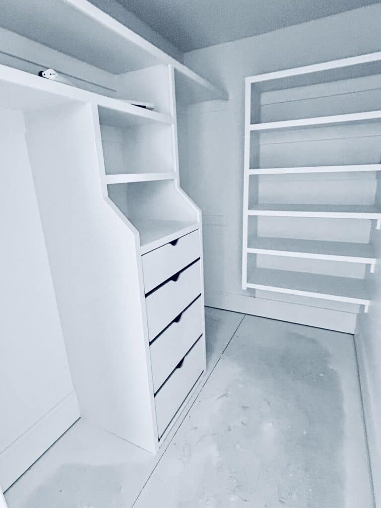 Custom closet design with built-in shelving by JB Shelving
